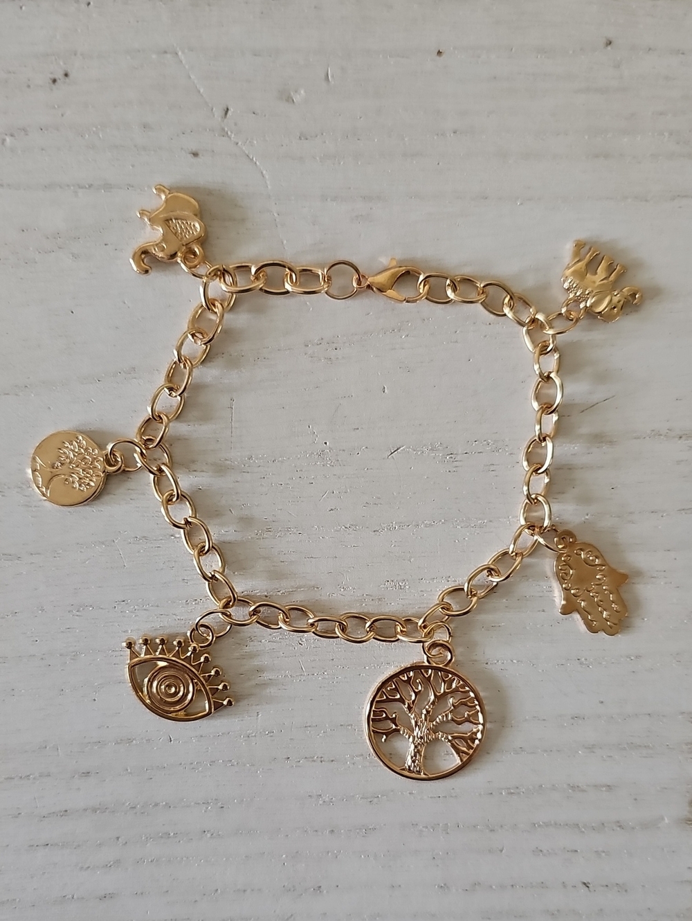 Gold Charm Bracelet with Tree, Eye and Hamsa Charms